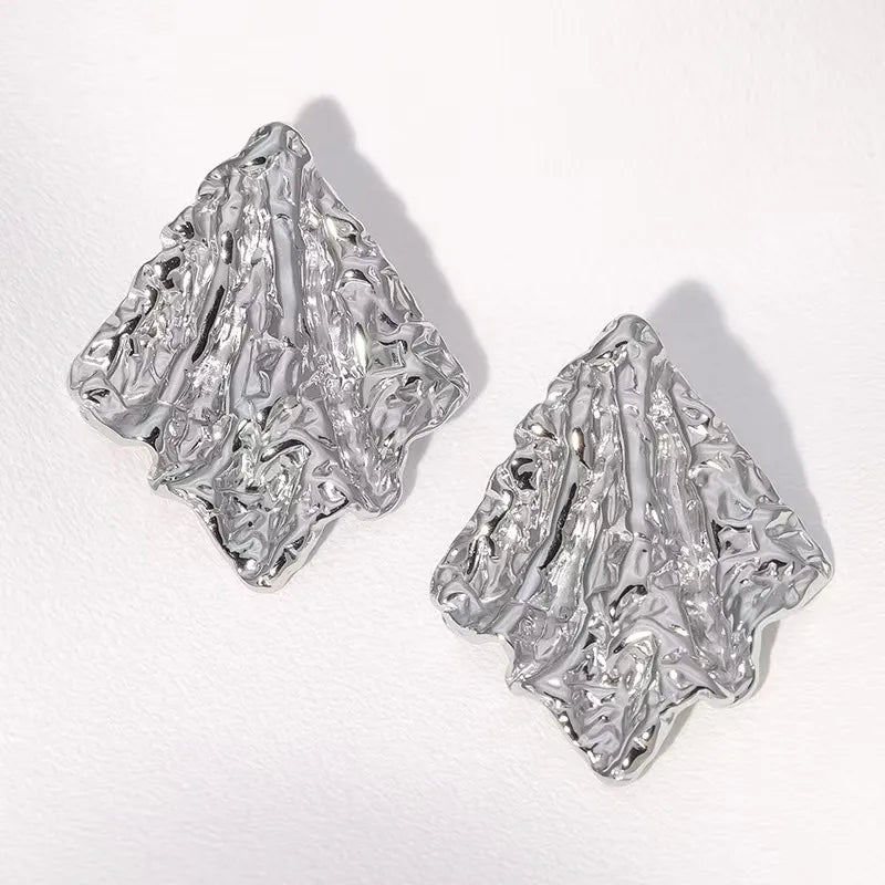 Aretes Mina
