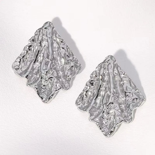 Aretes Mina