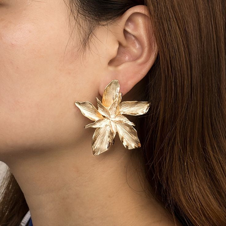 Aretes flor romana